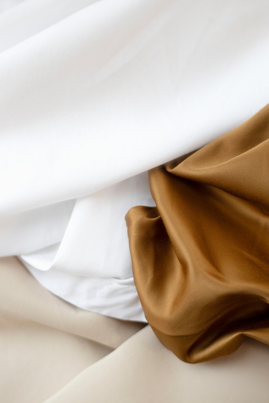 Brown Textile on White Textile